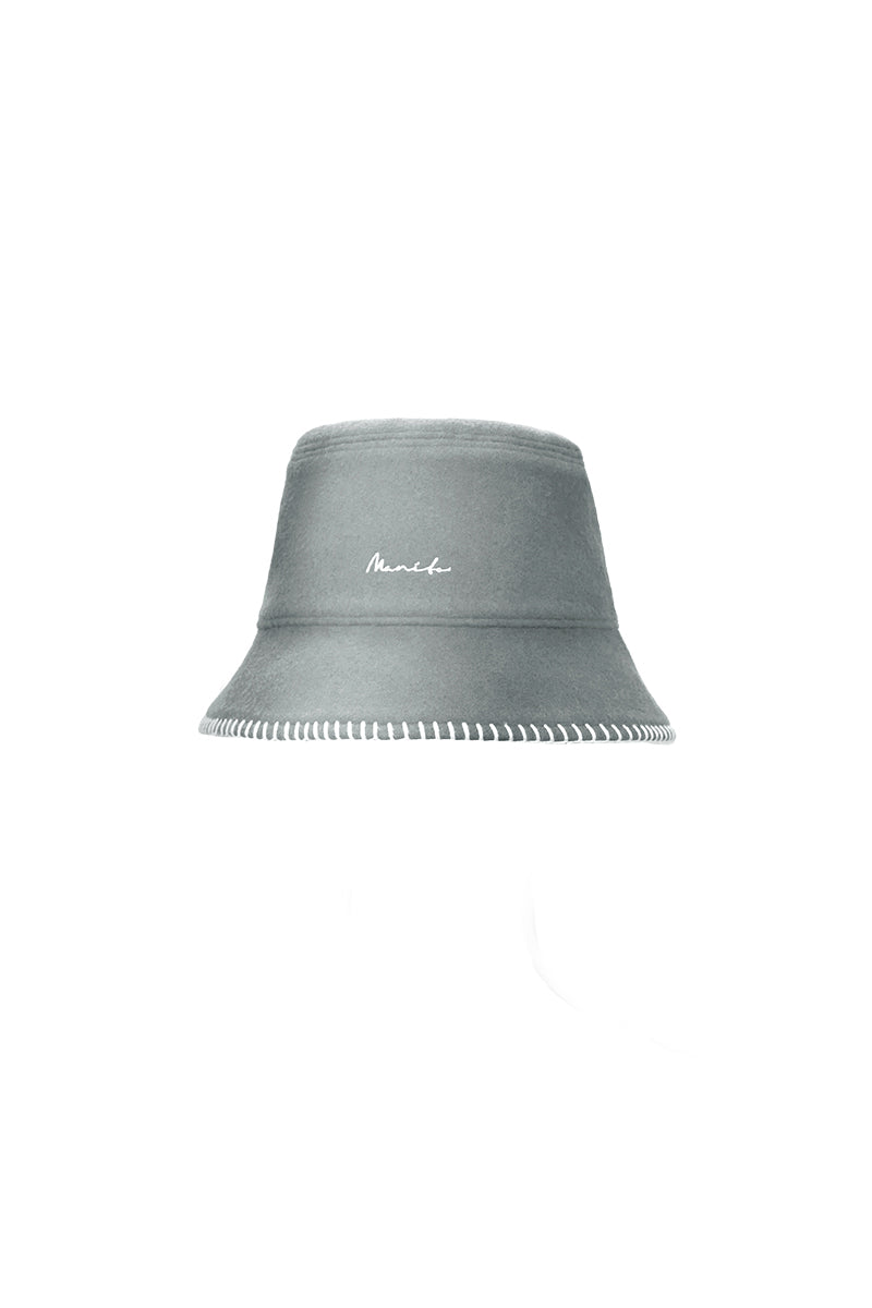 Gray Shell Women's Silk Wool Bucket Hat by MANITO, shown from a side angle with a soft, textured fabric and wide brim.