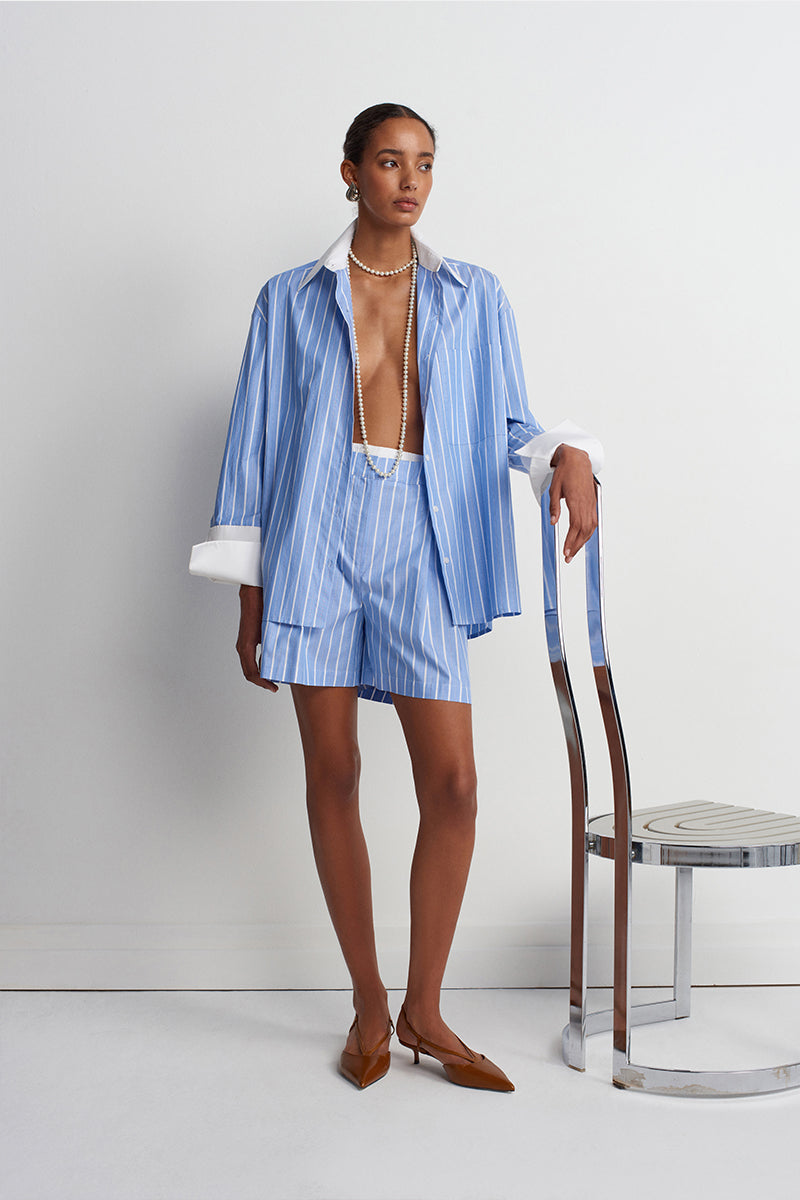 Blue striped Soulmate Twill Shorts by Acaria Studio, featuring a relaxed fit and casual style, displayed on a model.