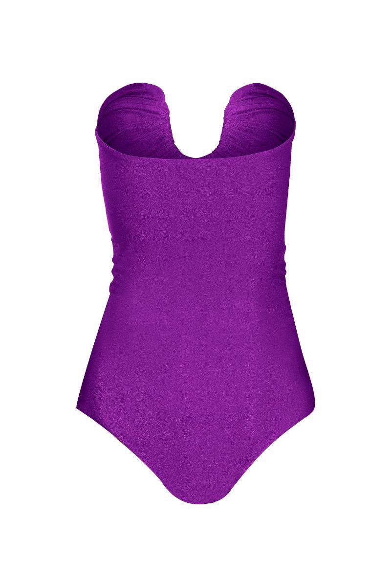 Purple one-piece swimsuit by Laura Escobar with a sleek, stylish design, perfect for swimming and beachwear.