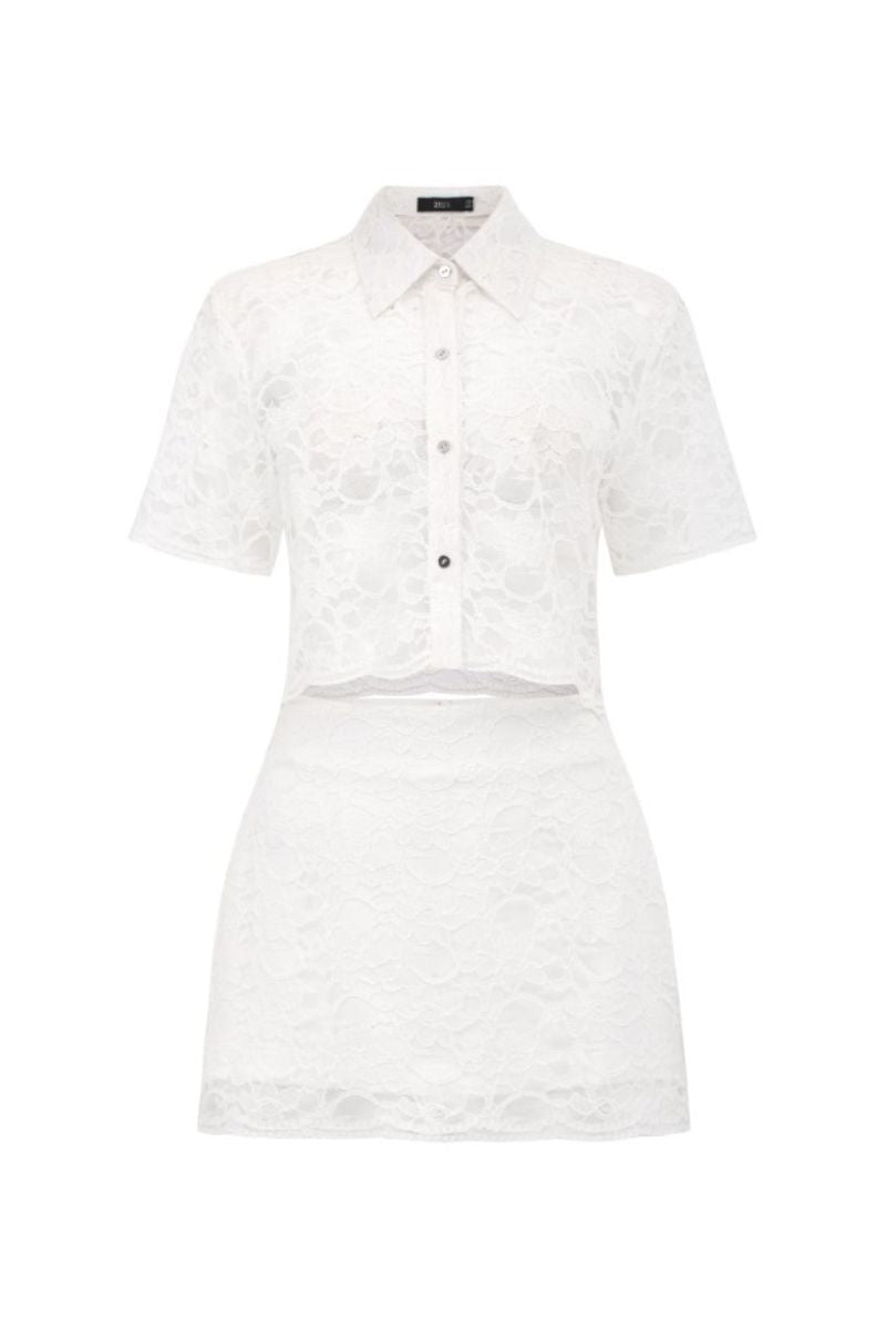 Lealia white lace co-ord set by 21Six featuring a lace top and matching skirt, displayed on a mannequin.