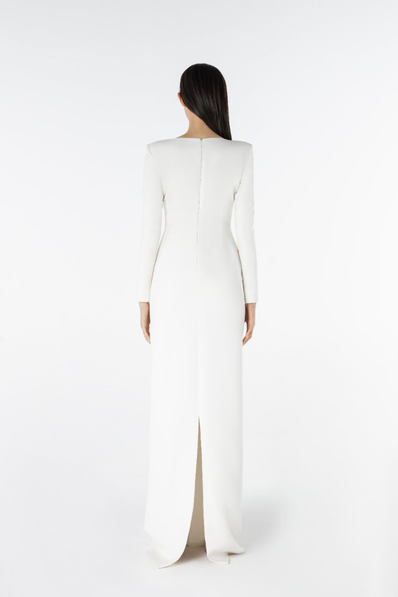Lili Blanc asymmetric maxi dress in flowing fabric with a unique hemline, perfect for elegant summer occasions.