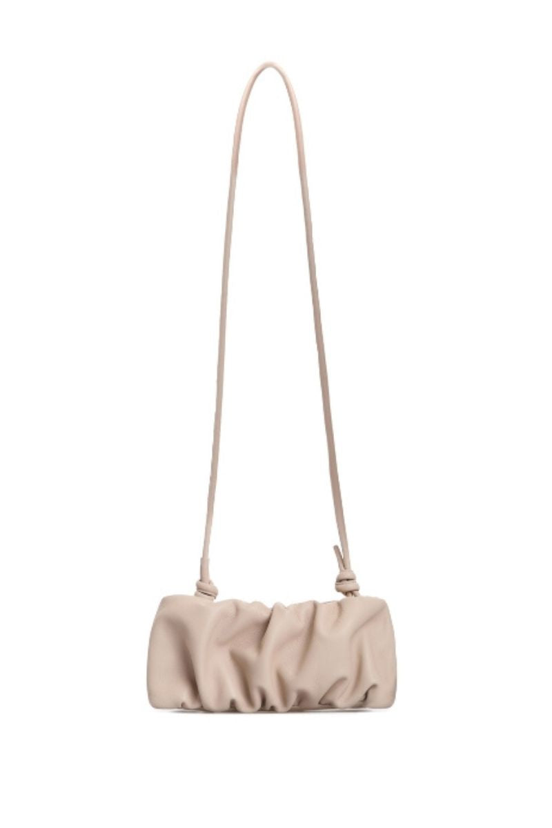 Beige Rosie shoulder bag by Vikele Studio, stylish and spacious accessory with a sleek design and shoulder strap.