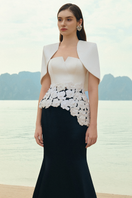 Lune De Soie pearl taffeta co-ord dress and cape set displayed on a mannequin with elegant design details.