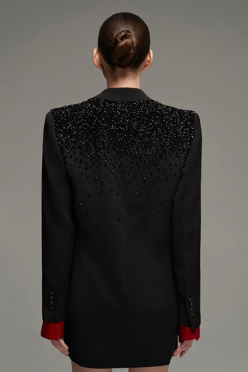 Black oversized double-breasted blazer by I.H.F Studio, tailored fit with wide lapels and long sleeves, displayed on a hanger.
