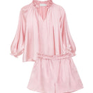 MANITO Sophia ruffle trim pink loungewear set featuring a blouse with ruffled details and matching shorts.