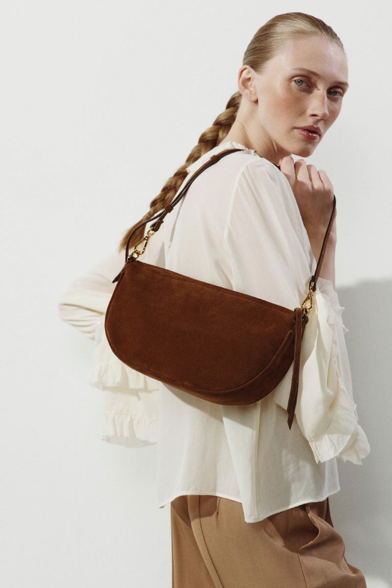 VIKELE STUDIO Denise mini shoulder bag in brown suede with sleek design and compact shape, perfect for everyday use.