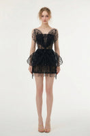 Black Sabrina lace and tulle mini dress by 21Six, featuring intricate lace details and a flowing tulle skirt.