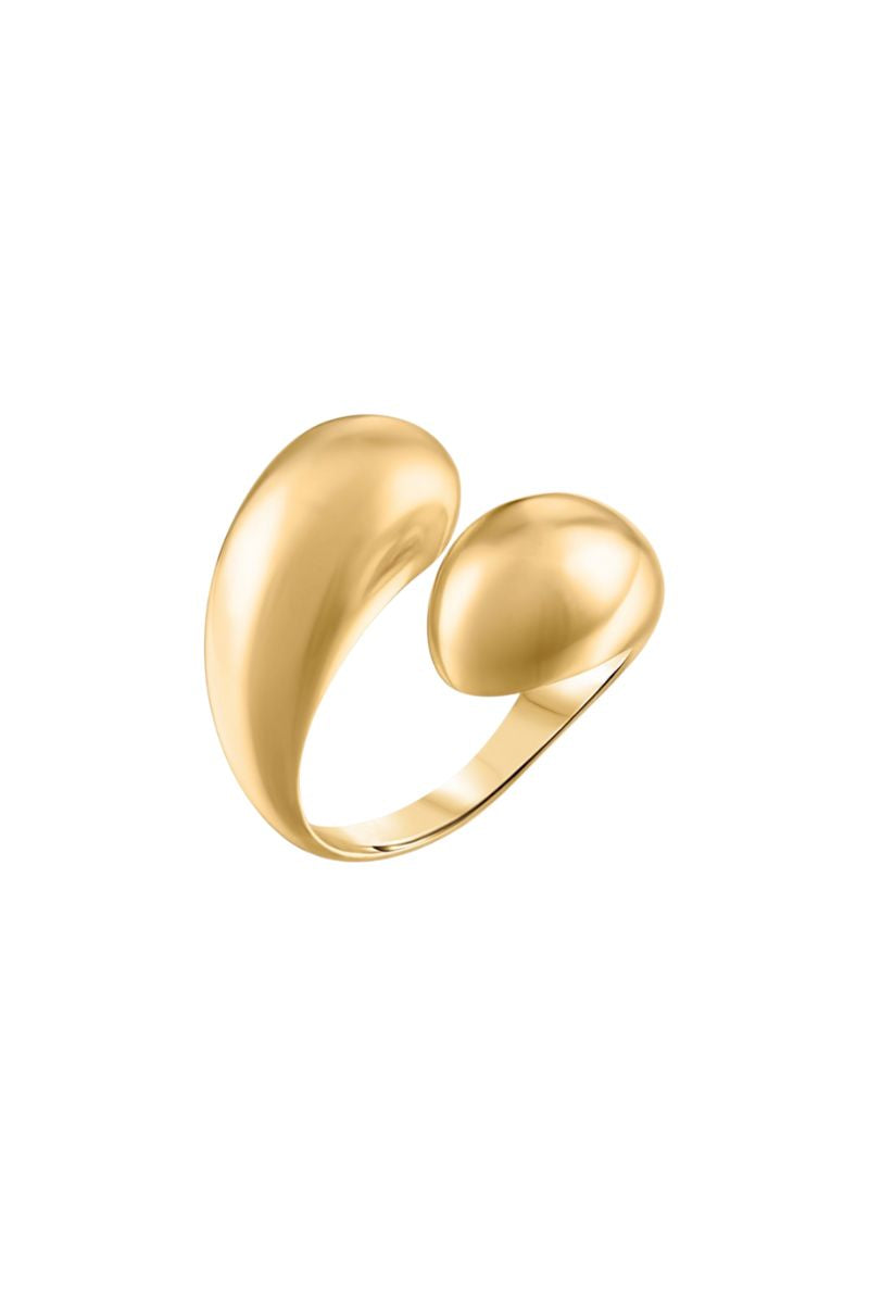 Sara Shala yellow gold vermeil clutch maxi ring with smooth band and statement design, shown on a model's hand.