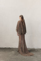 Nazlı Ceren crochet maxi skirt in antique bronze, featuring intricate crochet patterns and flowing fabric.