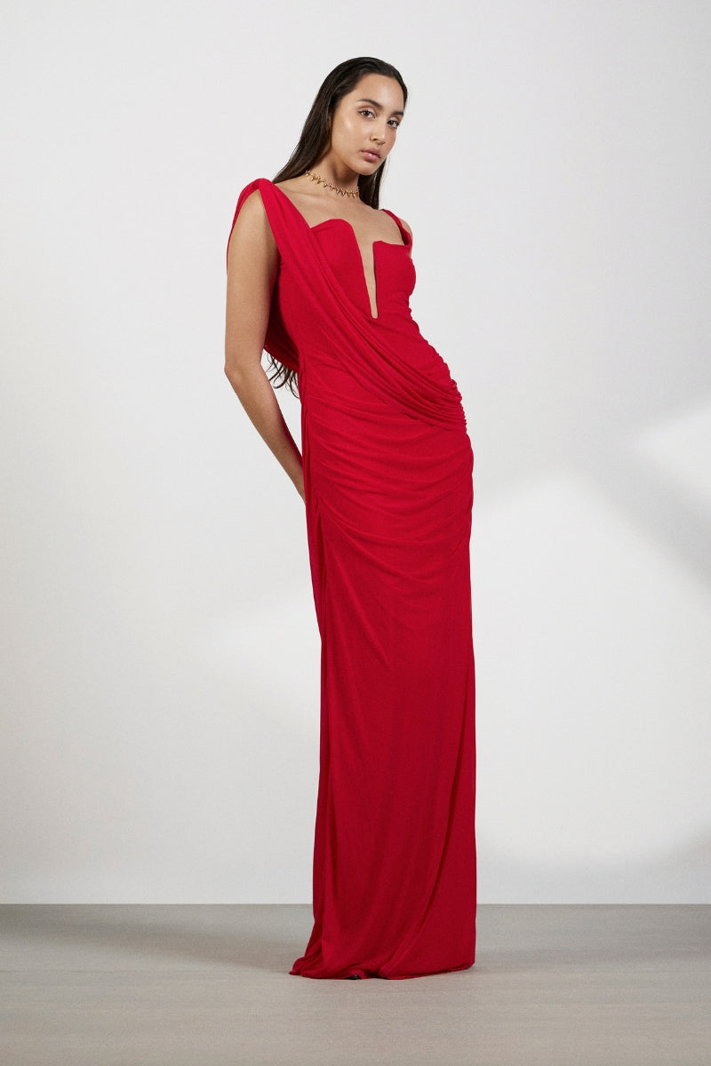 Deme By Gabriella Adriana Red Maxi Dress with flowing fabric and sleeveless design, styled for elegant summer occasions.