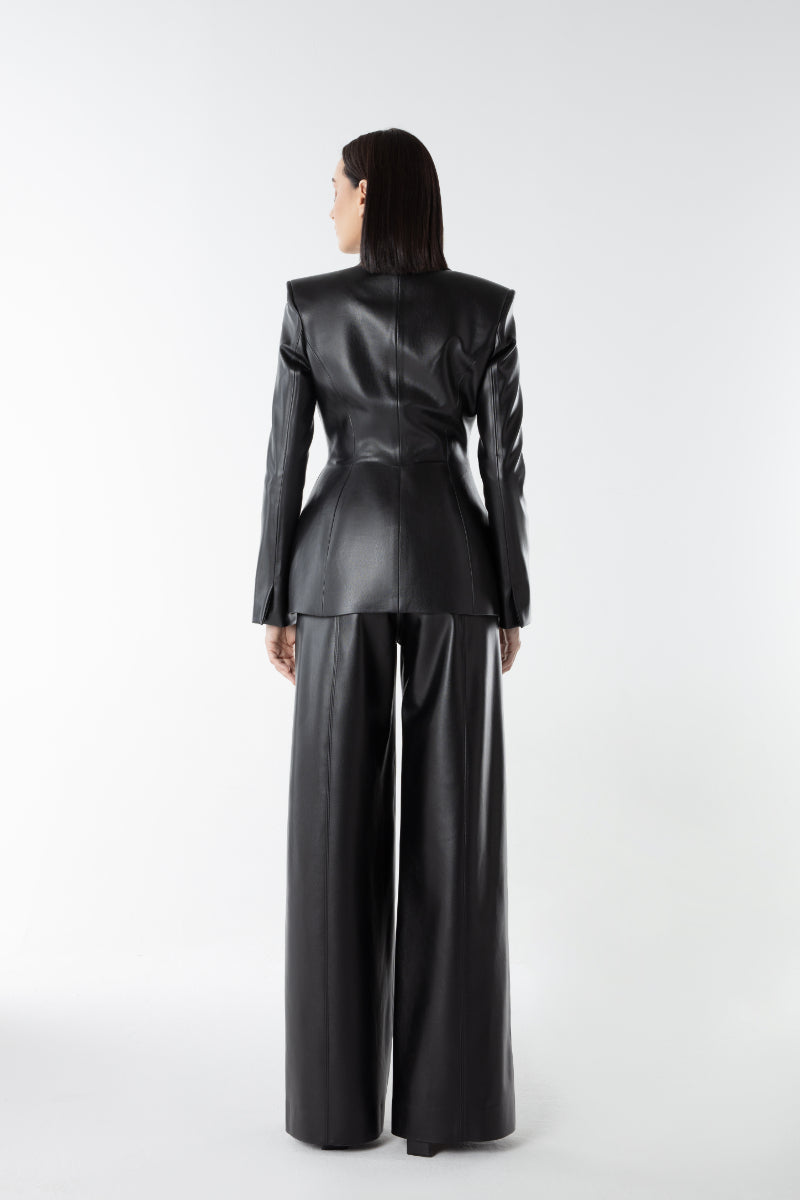 Lili Blanc vegan core trousers, stylish black pants with a tailored fit, made from eco-friendly vegan fabric.