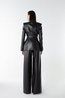 Lili Blanc vegan core trousers, stylish black pants with a tailored fit, made from eco-friendly vegan fabric.