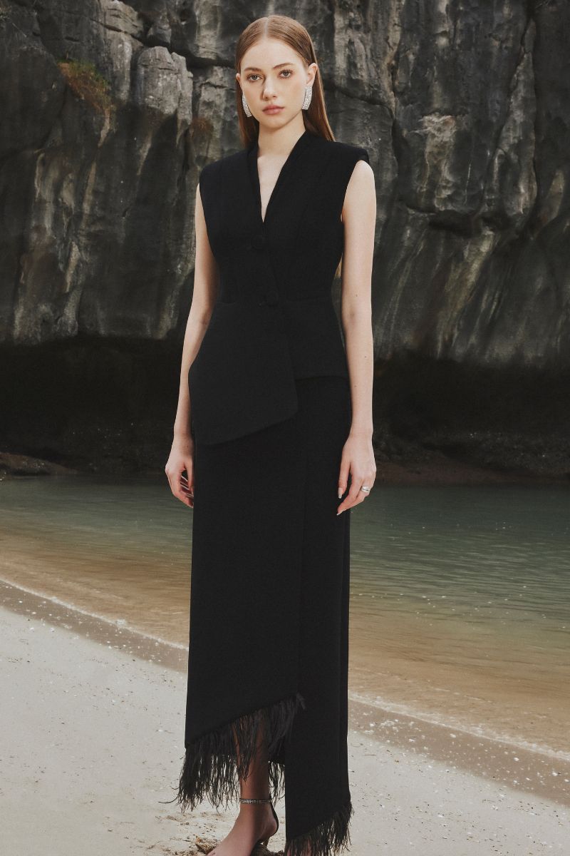 Tracy Studio asymmetric sleeveless blazer paired with feather skirt co-ords, stylish and modern fashion ensemble.