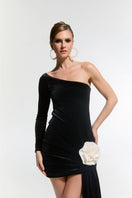 Nur Karaata Cult Mia Connaught velvet mini dress displayed on a hanger with a fitted silhouette and rich velvet fabric.