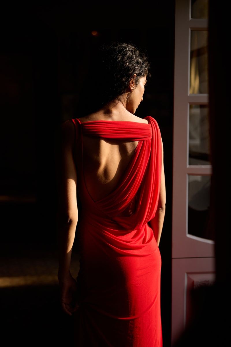 Deme By Gabriella Adriana Red Maxi Dress with flowing fabric and sleeveless design, perfect for elegant summer occasions.