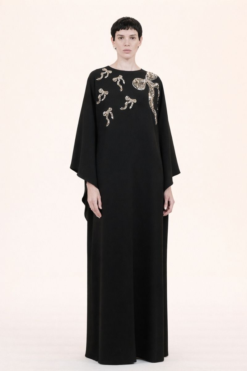 Nihan Peker NEEHAL Batwing Gown in elegant fabric, showcasing flowing batwing sleeves and intricate design details.