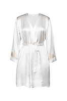 NK IMODE CULT MIA X NK IMODE Morgan short robe in ivory, soft fabric with relaxed fit and short sleeves, displayed hanging on a hook.