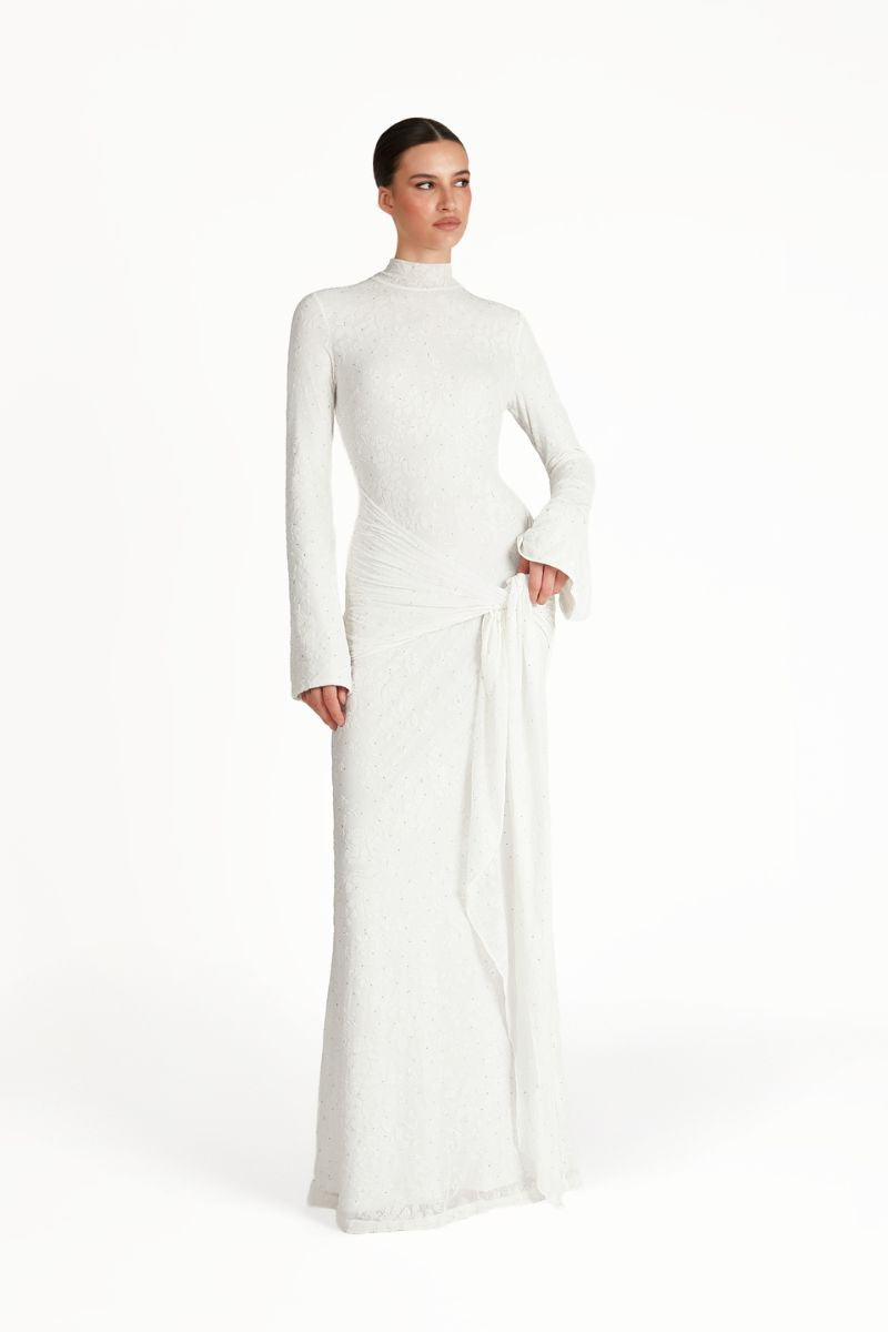 Khanum's KELI white maxi dress featuring a flowing silhouette and elegant design, perfect for casual or formal occasions