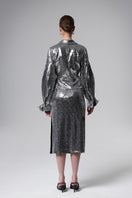 Liya Sparkle Blouse, stylish tops with shimmering fabric and elegant design, shown on a hanger.