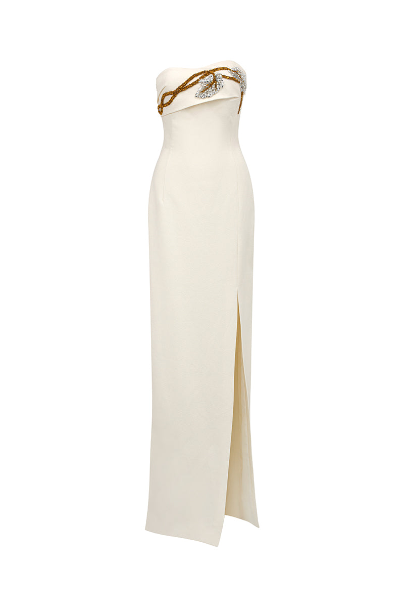 Elegant matte weave gown by Tracy Studio featuring a flowing design and intricate fabric texture.