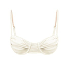 White pearl Gina glossy bikini top by Suncillo, featuring shiny finish and adjustable straps for a stylish beach look.