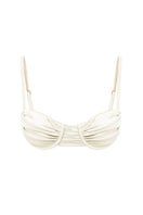 White pearl Gina glossy bikini top by Suncillo, featuring shiny finish and adjustable straps for a stylish beach look.