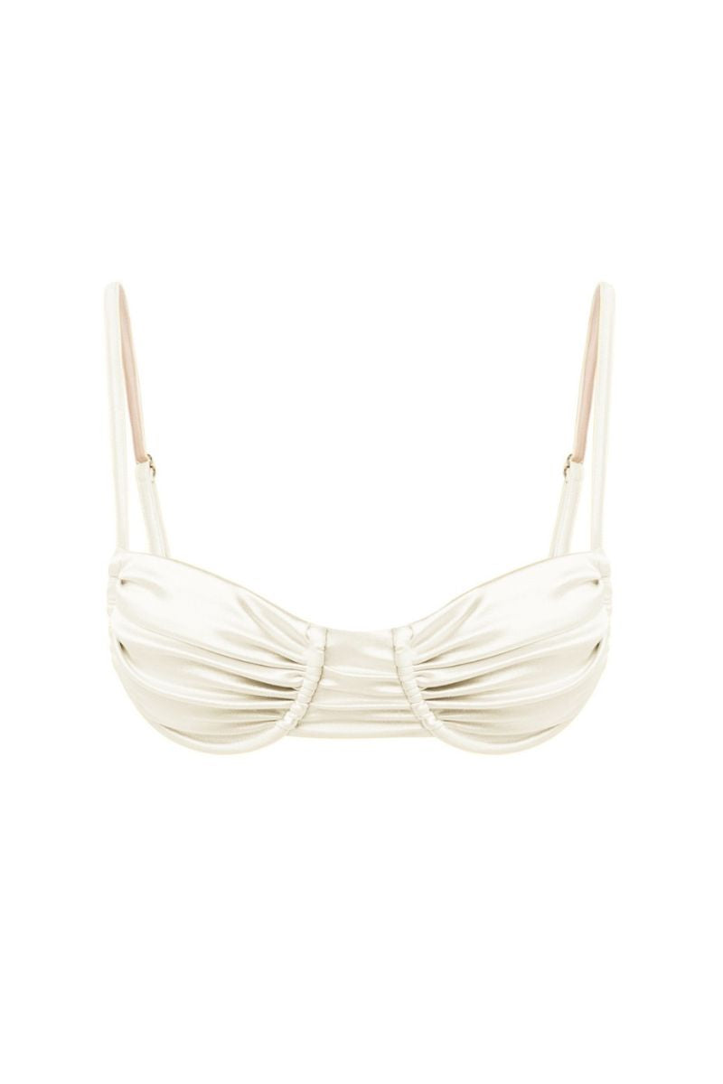 White pearl Gina glossy bikini top by Suncillo, featuring shiny finish and adjustable straps for a stylish beach look.