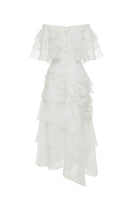 White Plan Thomas maxi dress displayed on a hanger, featuring a flowing fabric and elegant design, perfect for summer or casual wear.