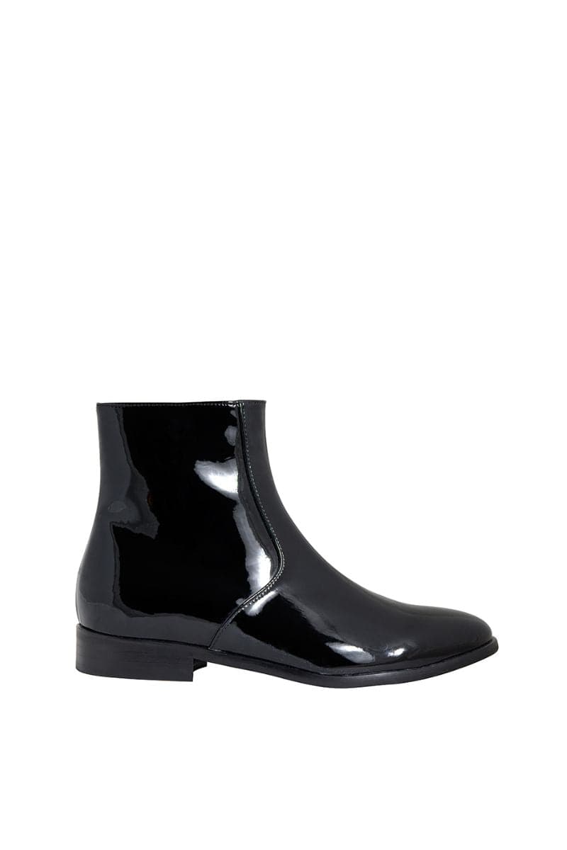 A pair of black patent-effect ankle boots by AERA with sleek design and chunky heels, displayed on a neutral background.
