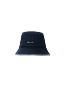 Manito Shell women's silk wool bucket hat in navy, showcasing a stylish wide-brim hat made of soft silk wool fabric.