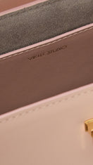 VIKELE STUDIO Stephanie pink top handle bag with sleek design and smooth finish, featuring a stylish, compact silhouette.