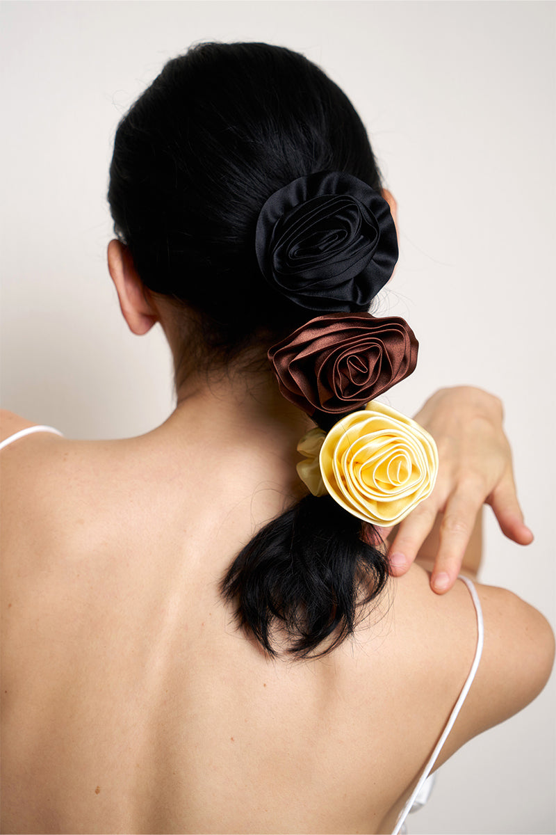 Six Tuscan Rose silk scrunchies from Not Just Pajama, soft and luxurious hair accessories with a smooth, elegant finish.