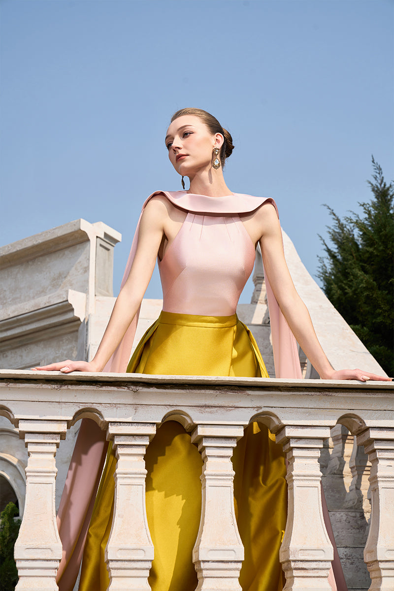 Pink and yellow bamboo taffeta gown by Tracy Studio, featuring elegant fabric and flowing silhouette.