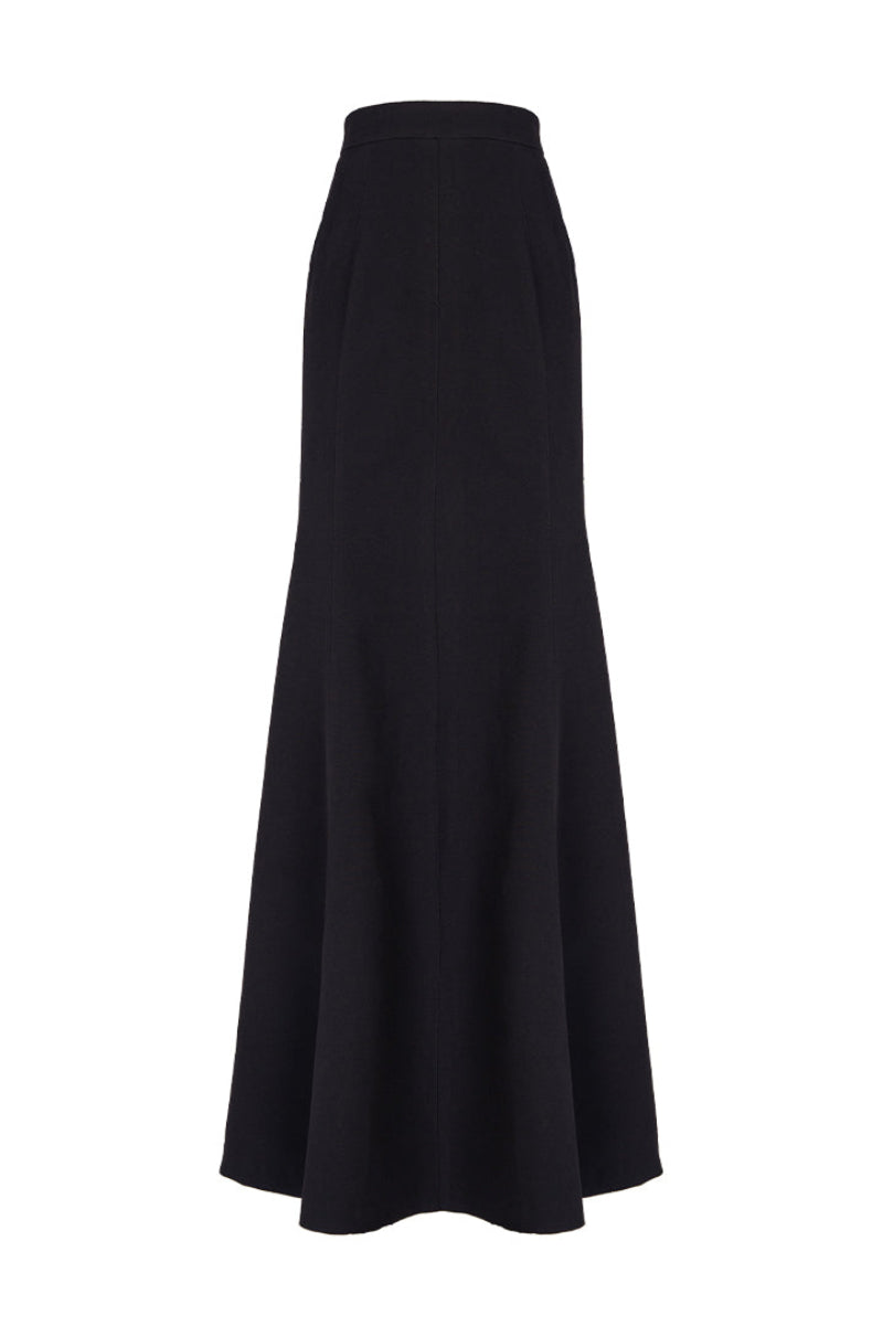 Black paneled construction mermaid maxi skirt by GVLUX, featuring a fitted silhouette with layered panel details.