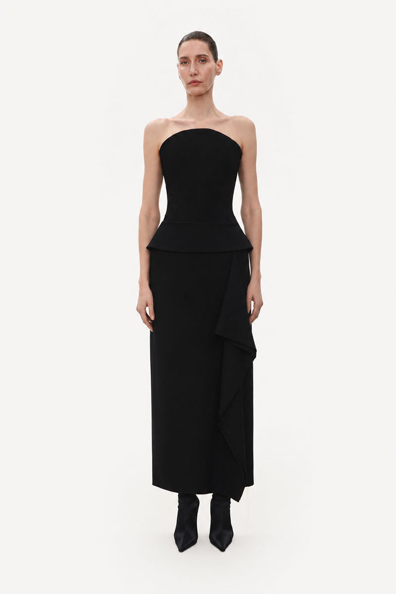 Black corset wool midi dress by ELENAREVA featuring a fitted silhouette and elegant design, shown on a model.