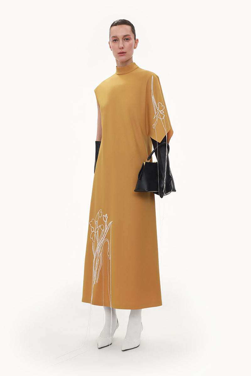 Elenareva ochre one-sleeve embroidered wool midi dress displayed on a model, showcasing its elegant design and intricate embroidery.