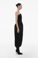 Elegant black wool bustier midi dress with silk skirt by ElenaReva, showcasing a fitted bodice and flowing skirt detail.
