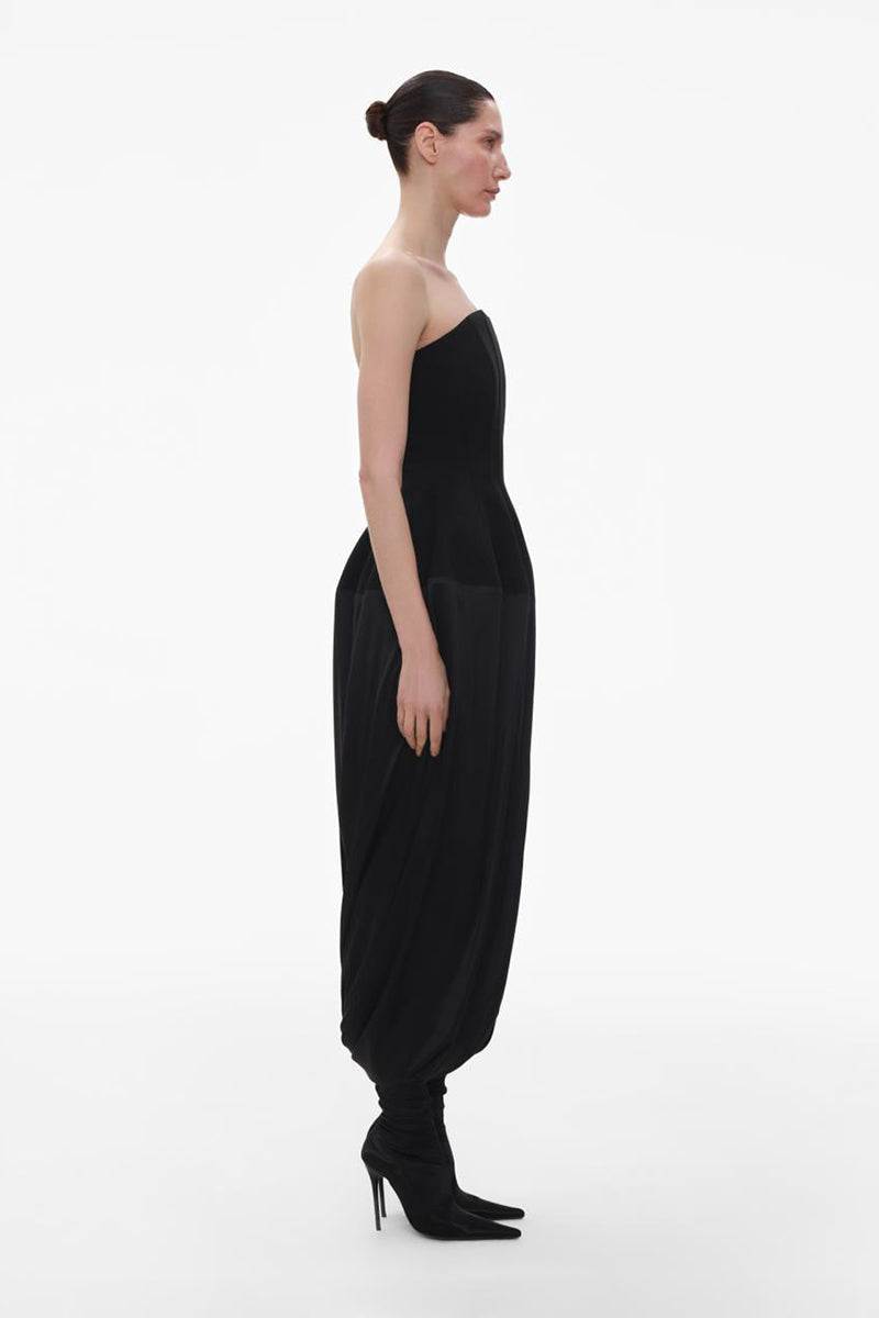 Elegant black wool bustier midi dress with silk skirt by ElenaReva, showcasing a fitted bodice and flowing skirt detail.