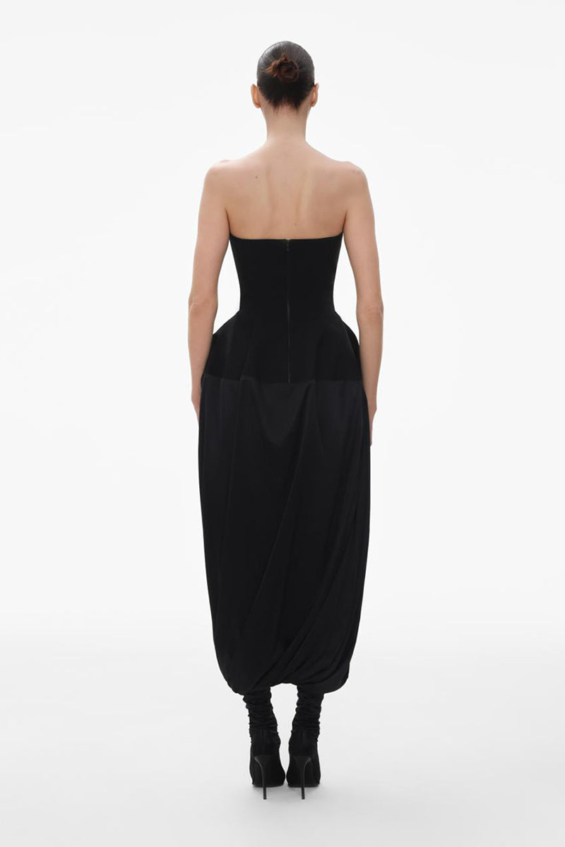 Black wool bustier midi dress with silk skirt by ELENAREVA, featuring a fitted bodice and flowing midi-length skirt.