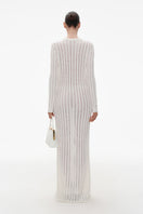 Ivory cashmere knit maxi dress by ELENAREVA, featuring a soft, cozy fabric with a flowing silhouette and elegant design.