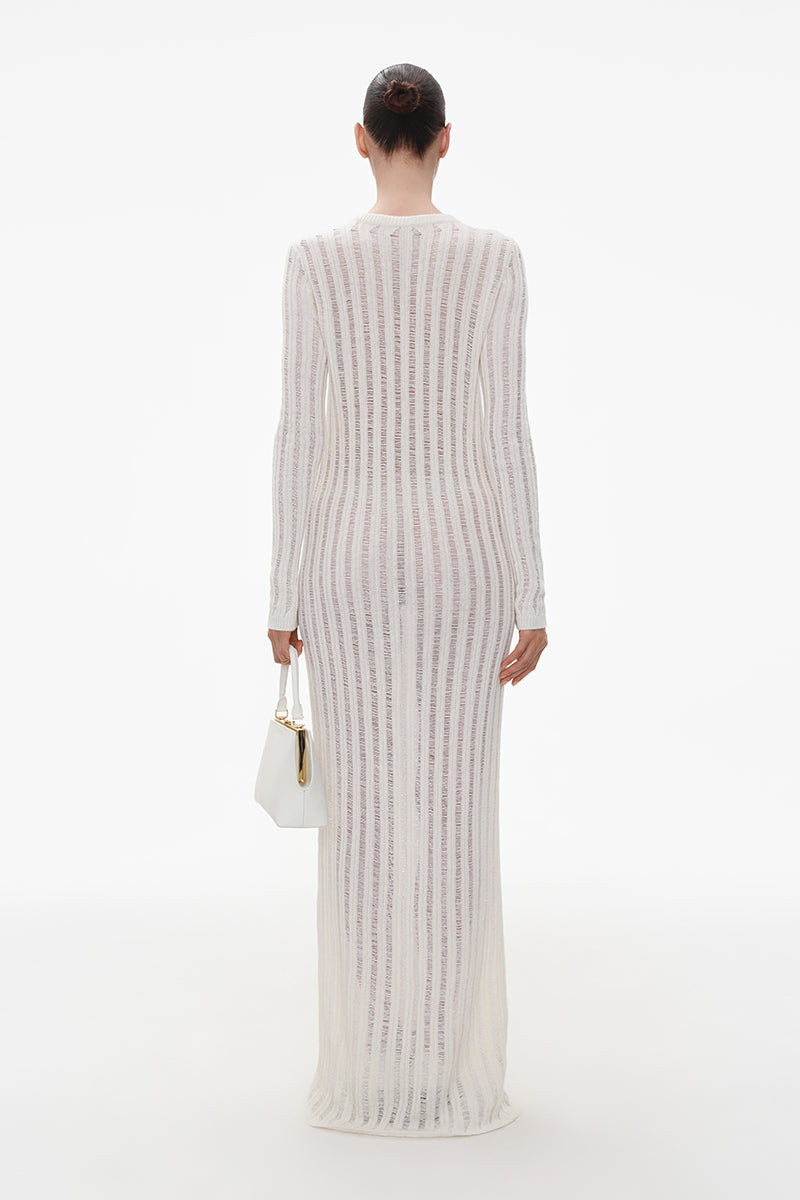 Ivory cashmere knit maxi dress by ELENAREVA, featuring a soft, cozy fabric with a flowing silhouette and elegant design.