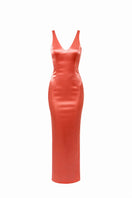 Junie coral maxi dress with a flowing silhouette and adjustable straps, perfect for summer or casual occasions.