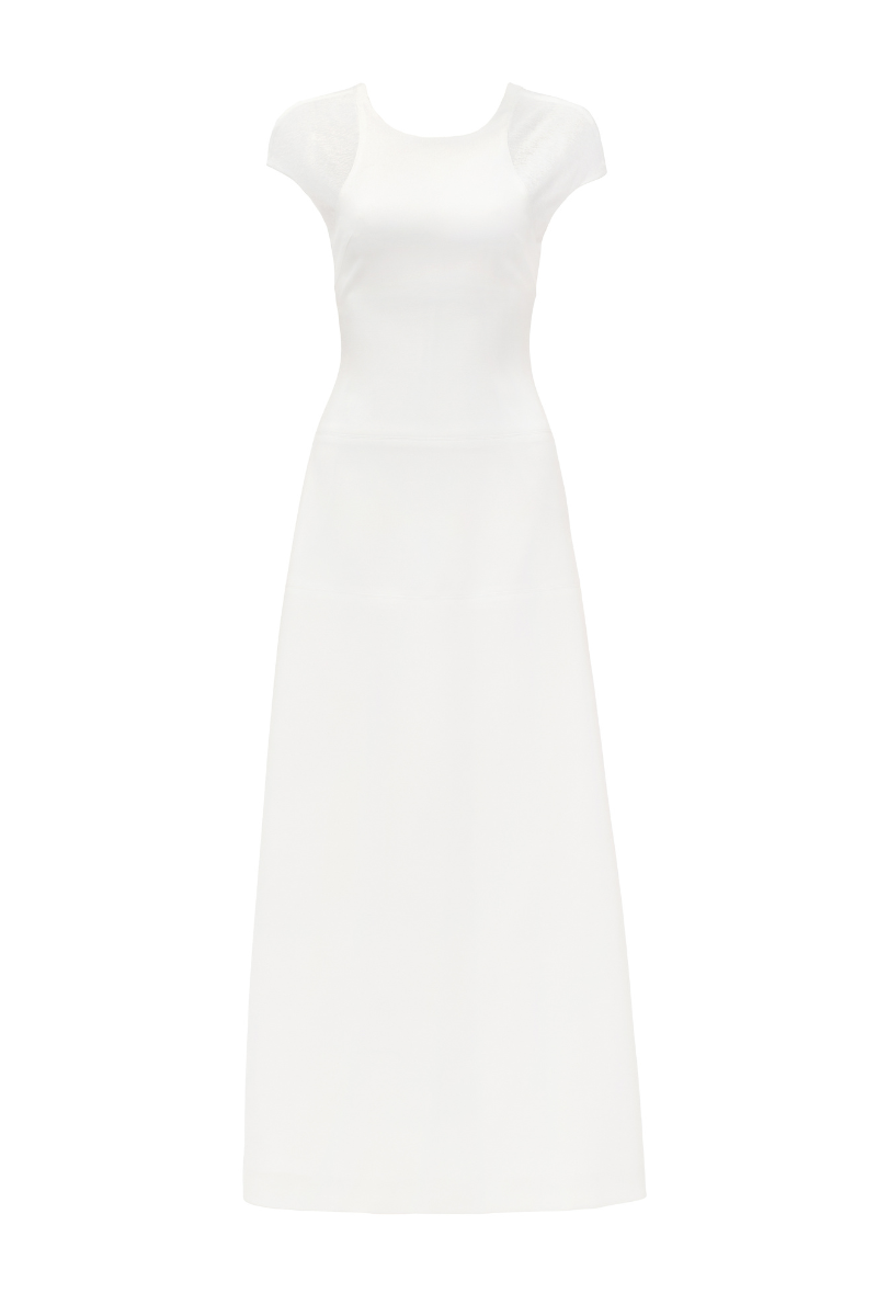 White SQUEEZE Maxi Dress by TONYY, flowing fabric, sleeveless style, and elegant design for casual or formal occasions.