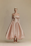 White Plan Veronica gown featuring elegant fabric and intricate design, perfect for formal occasions.