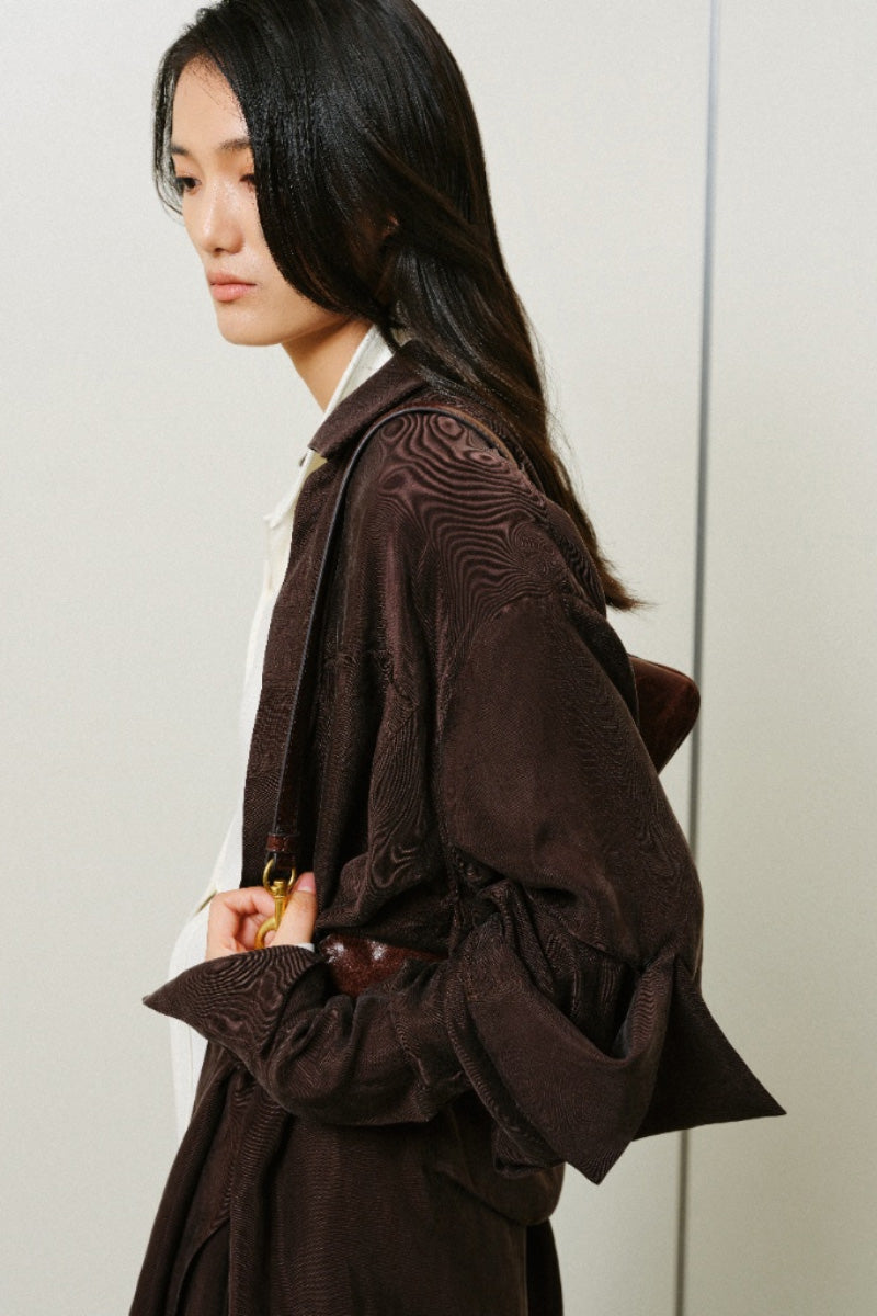 Oversized double-layer cuff shirt by Leicia featuring a relaxed fit, long sleeves, and a layered collar design.