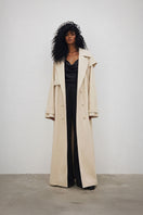 Deme By Gabriella Bambi Jacket displayed on a hanger, featuring a stylish, lightweight jacket design with zipper closure.