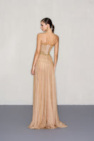 CEM embellished corset bodice gown featuring intricate beadwork and a fitted silhouette, displayed on a mannequin.