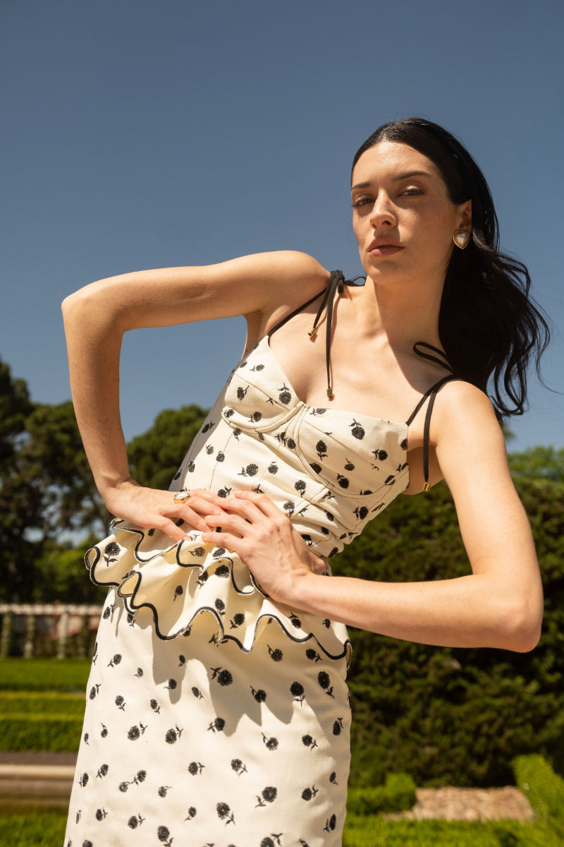 ROSITA PEPLUM TOP IN IVORY AND BLACK - CULT MIA
