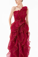 HAPPY CLOTHING CULT MIA X burgundy sculpted petal one-shoulder gown displayed on a model, featuring elegant draping and asymmetric design.