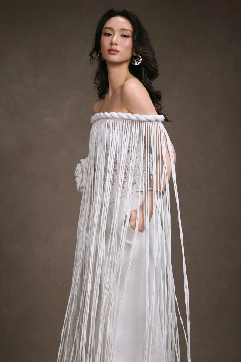 KEIRA TONG fringe lace corset top with intricate lace details and fringe accents, shown on a model.